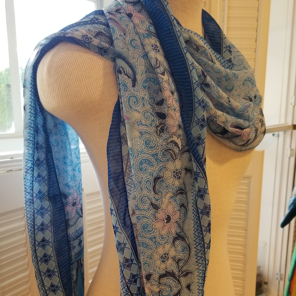 Sheer and light blue muffler